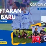 Skuad SSB Gelora Muda Kelompok Umur 2015 berfoto bersama piala kemenangan setelah menjuarai turnamen Fun Game Taboka 2026.